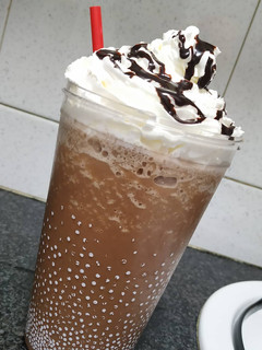 Una foto de Frappé de café latte