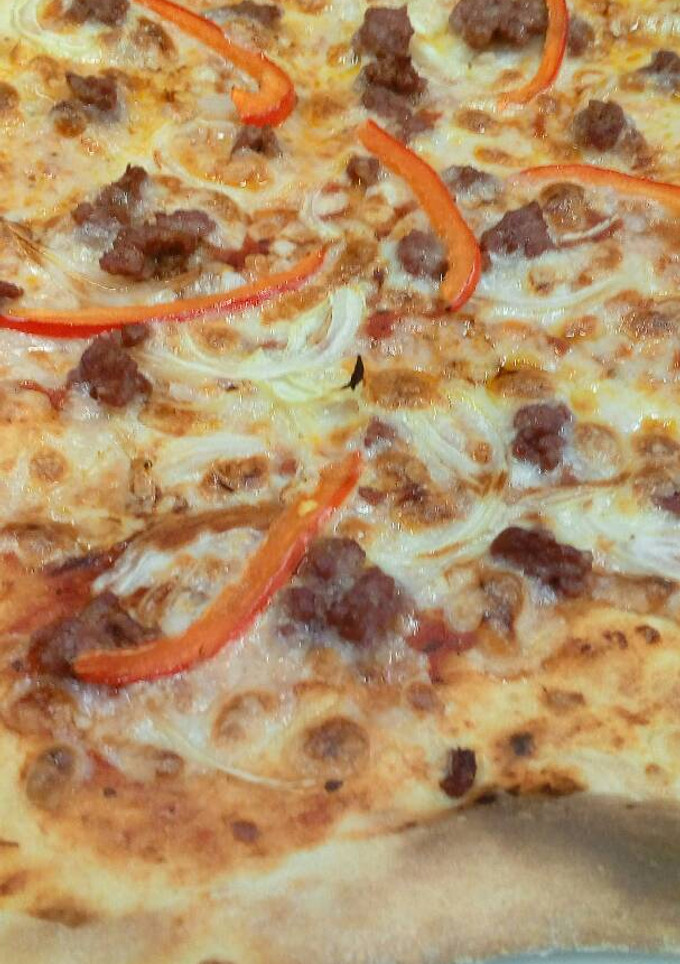 Una foto de Pizza italiana
