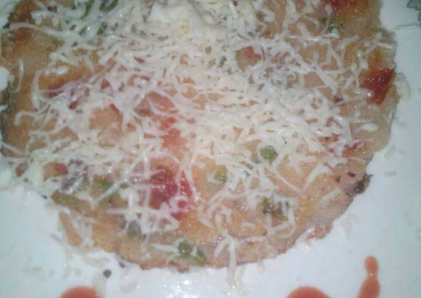 Cheesy semolina uttapam with italian touch