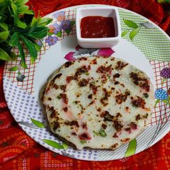 A picture of Atukulu Uttapam - South Indian Breakfast.