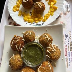 A picture of Mexican starter corn cheese balls.