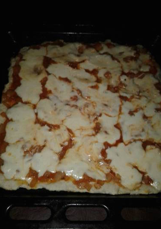 Una foto de Pizzas rápidas con harina leudante y común con masa saborizada