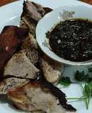 Cerdo asado con aderezo de salsa soya, perejil y ajo