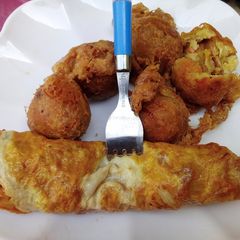 A picture of Yam Balls and Fried Egg.