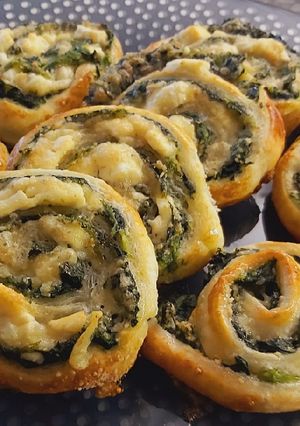 Una foto de Espirales de espinacas y queso feta
