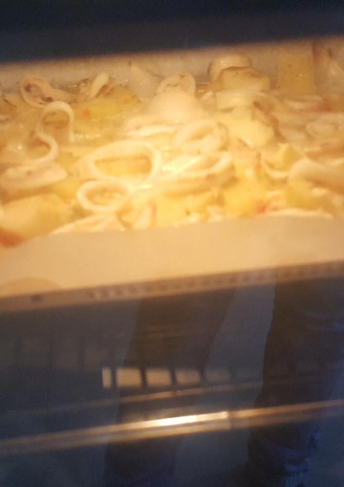 Una foto de Asado de patatas y calamares