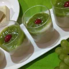 A picture of Green grapes and white chocolate delight.