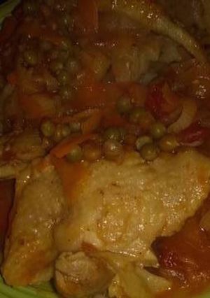 Una foto de Pollo arvejado