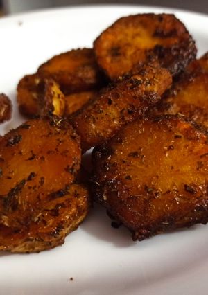 Una foto de Papas al horno con costra crocante