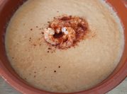 Una foto de crema de pescados