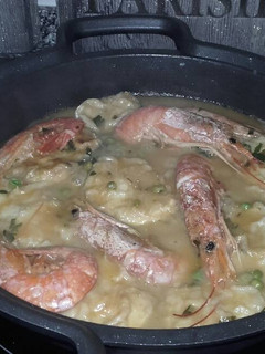 Una foto de Merluza en salsa con gambas