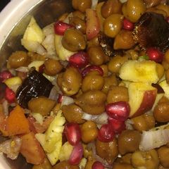 A picture of Healthy breakfast with Chana mix with fruits and dry fruits.
