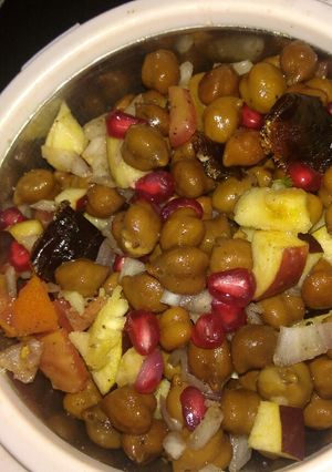 A picture of Healthy breakfast with Chana mix with fruits and dry fruits.