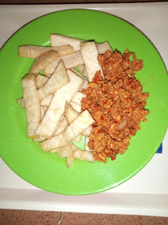 A picture of Fried yam nd scrambled eggs.