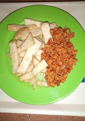 A picture of Fried yam nd scrambled eggs.