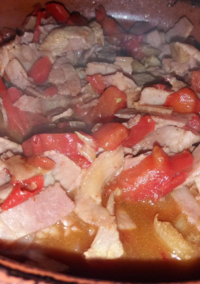 Una foto de Lacón con pimiento rojo y ajos