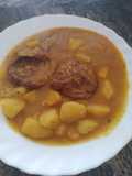Guisado de patatas con cuello de cordero
