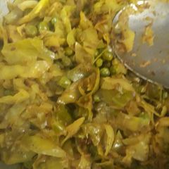 A picture of Sabzi of cauliflower and peas.
