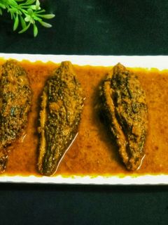 भरवां करेला मसाला करी(Bharwa Karela Masala Recipe in Hindi) रेसिपी मुख्य फोटो