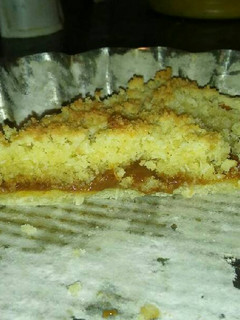 Una foto de Tarta de dulce de leche con Crumble de Coco 😘
