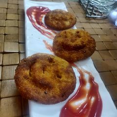 A picture of Chilli Garlic Potato Smileys.