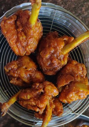 A picture of Schezwan lolipop chicken.