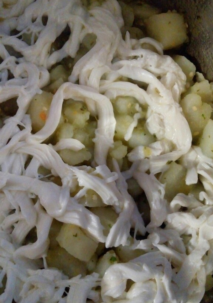 Una foto de Papas en salsa verde 💚 con queso