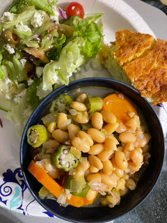 A picture of Cook all day Great Northern Beans with smoked Turkey parts.