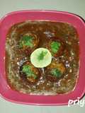 Bottle ground kofta in curry