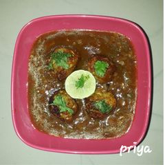 Bottle ground kofta in curry A picture of Bottle ground kofta in curry.