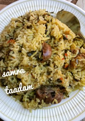 A picture of Jollof rice with moringa.