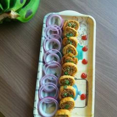 A picture of Raw banana samosa pinwheel.