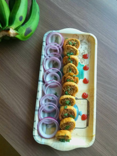 A picture of Raw banana samosa pinwheel.
