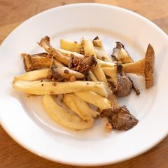 A picture of Sautéed King Oyster Mushrooms with Garlic.