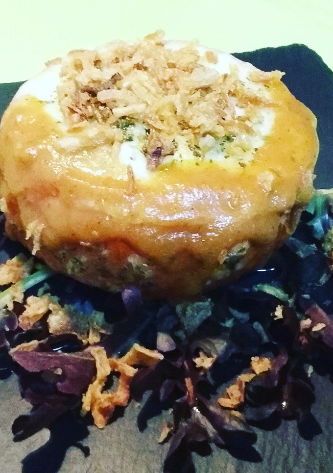 Una foto de Tomate gratinado