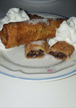 Una foto de Enrolladitos de nocilla🍫
