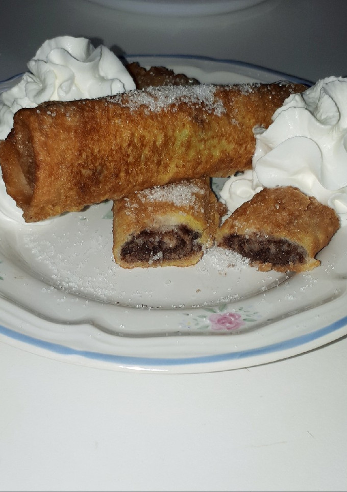 Una foto de Enrolladitos de nocilla🍫