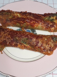 Una foto de Canelones de ricota y jamón con masa crepes de espinaca