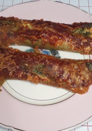 Una foto de Canelones de ricota y jamón con masa crepes de espinaca