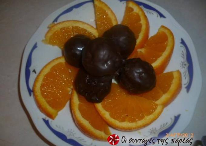 κύρια φωτογραφία συνταγής Σοκολατάκια με γέμιση πορτοκάλι