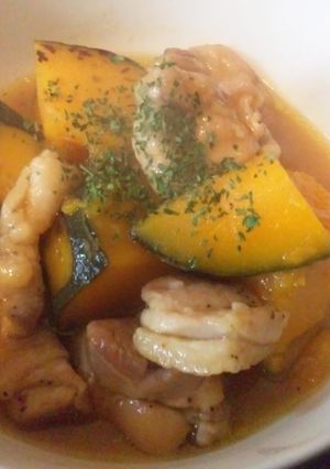 A picture of Simmered Pumpkin and Chicken Thighs in Broth.