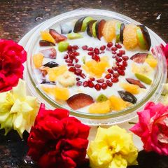A picture of Fruit Cake Bhallas in fruit Yogurt.