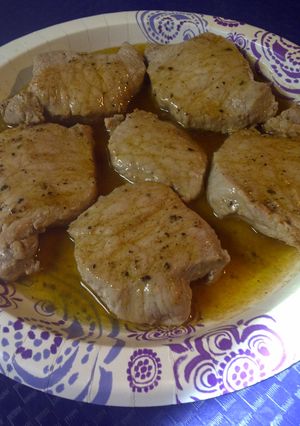 A picture of Peppered pork in a buttery wine sauce.