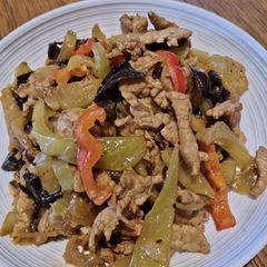 A picture of Pork Strips with Pickled Veggie.