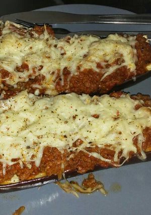 A picture of Eggplant with beef sauce and cheese.