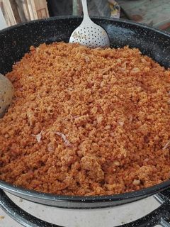 Una foto de Migas con pimientos y naranja