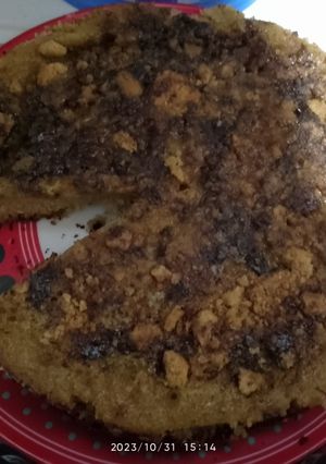 Una foto de Queque en Olla con Milo y rosquilla de coco por encima 🤭