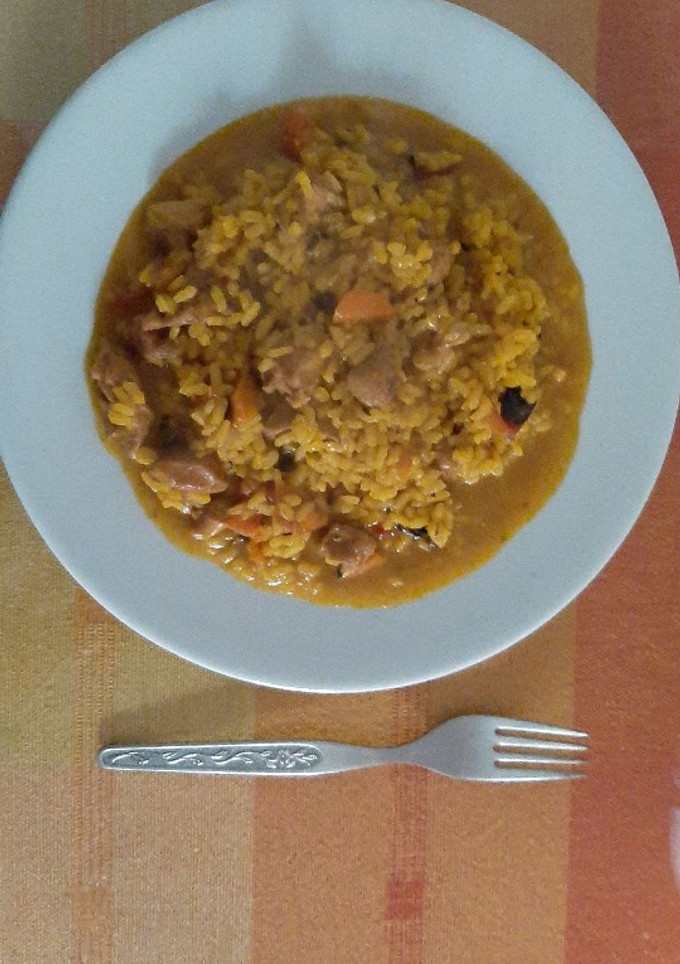 Una foto de Arroz con pavo a la naranja
