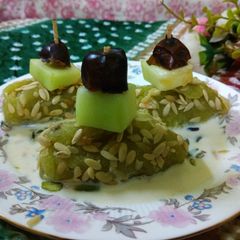 A picture of Melon Mewa Rolls in Rabari dip.