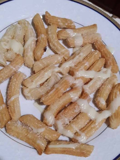 Una foto de Churros rellenos de dulce de leche